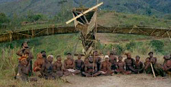 Photo of Melanesians with bamboo plane