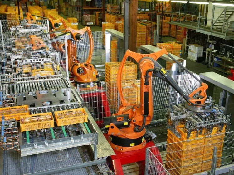 manufacturing automation in a bread production plant, iot in manufacturing monitoring pallet sorting robots