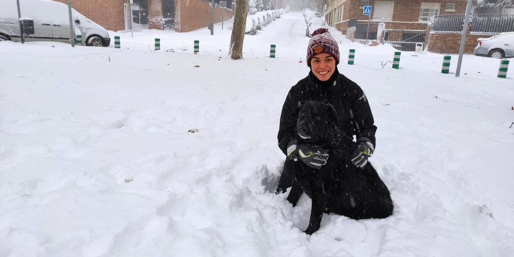 employee spotlight Leti Escanciano in the snow with her dog Samba