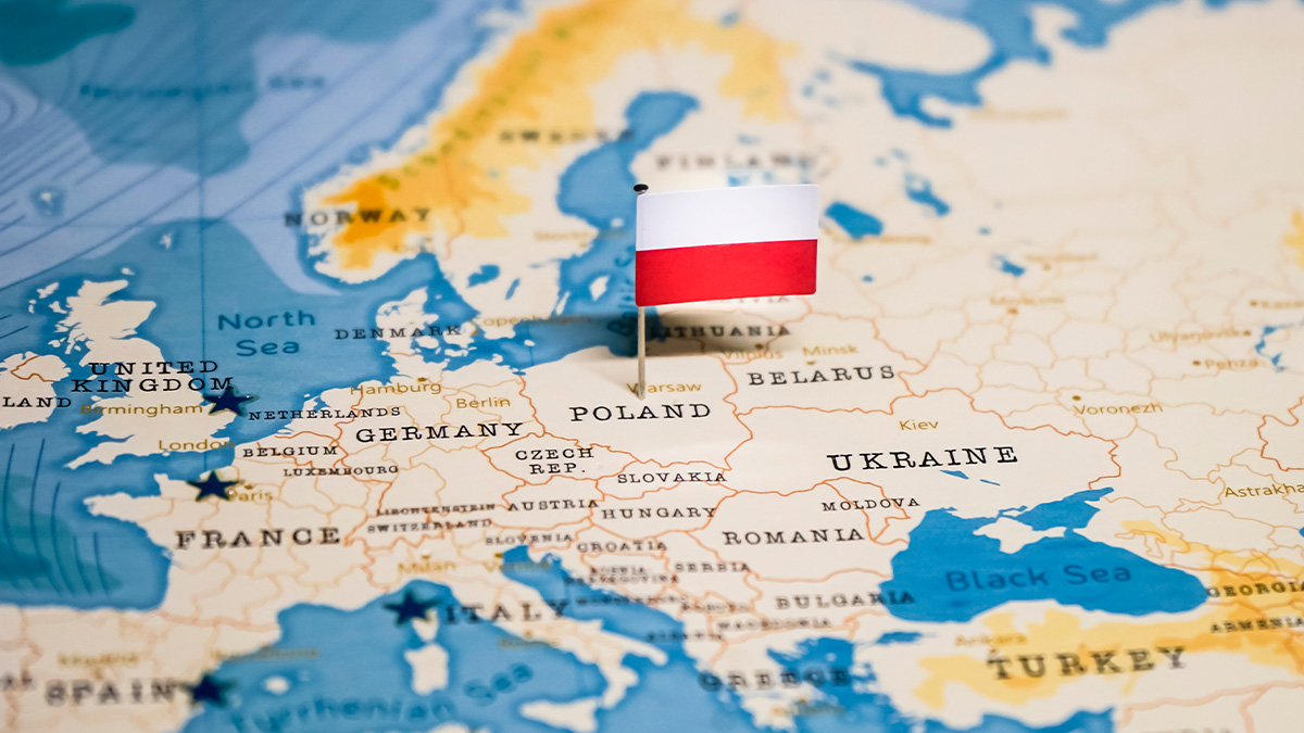 This is an image of the map of Europe with the flag of Poland pinned to it.